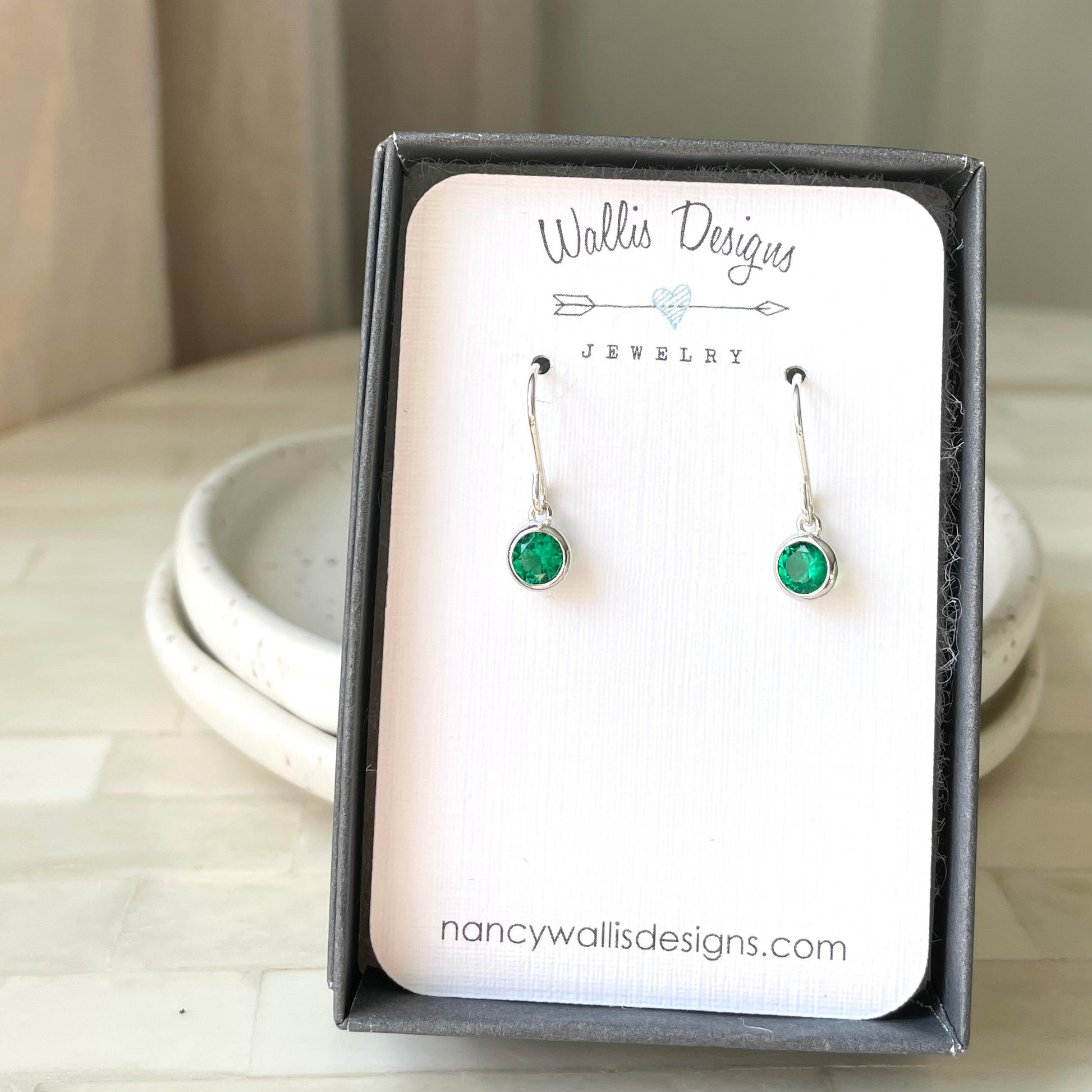 May birthstone earrings made by Nancy Wallis Designs. 