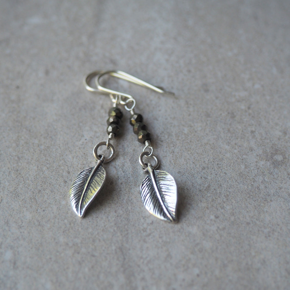 Handmade earrings by Nancy Wallis Designs. Silver Leaves.