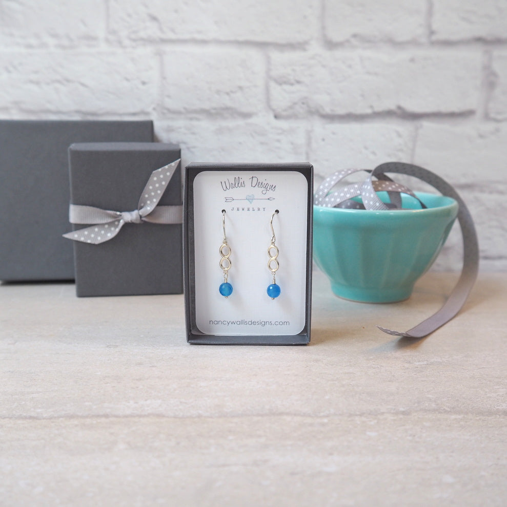 Infinity Earrings with Blue Gemstone by Nancy Wallis Designs