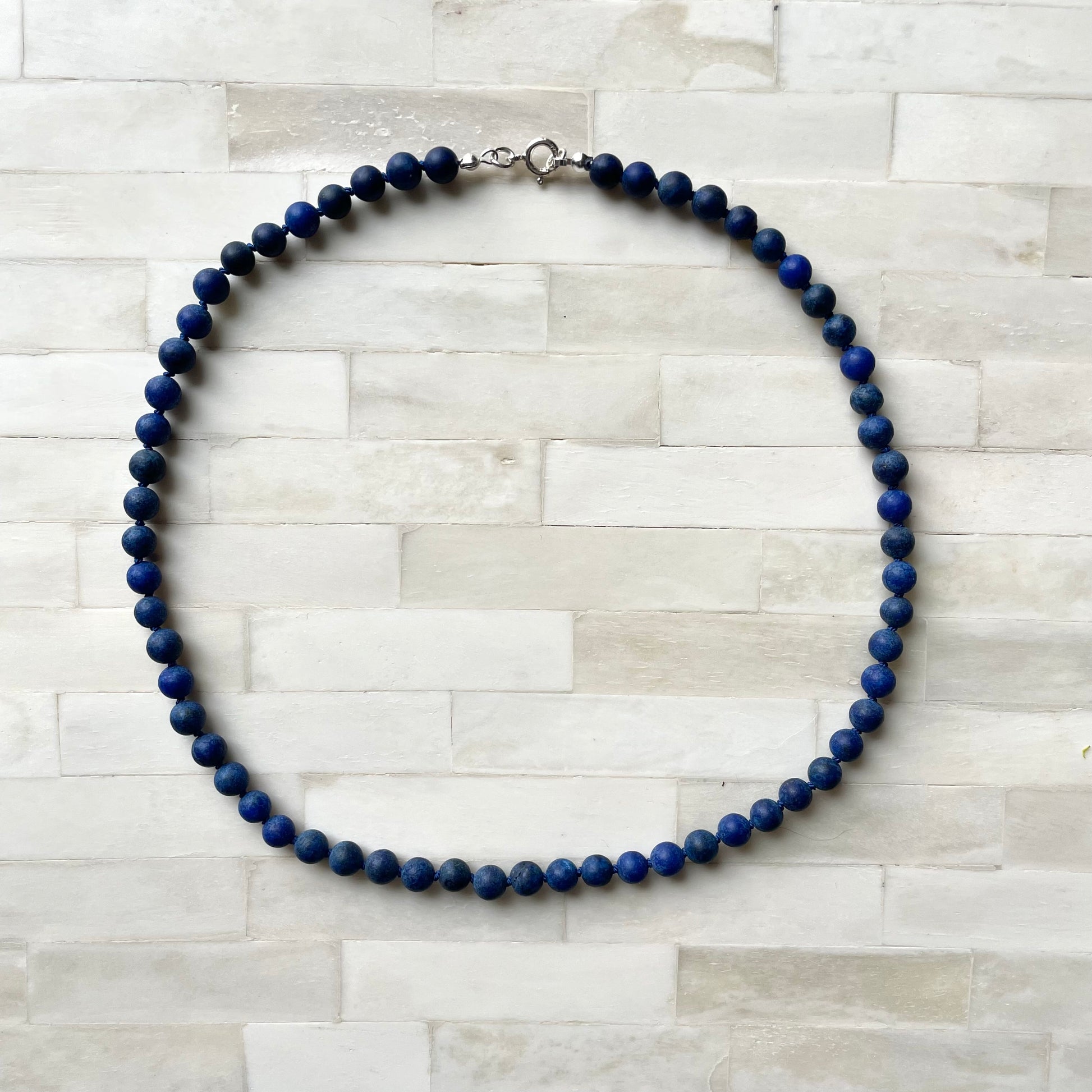 Hank knotted beaded necklace. Semi precious lapis lazuli necklace.