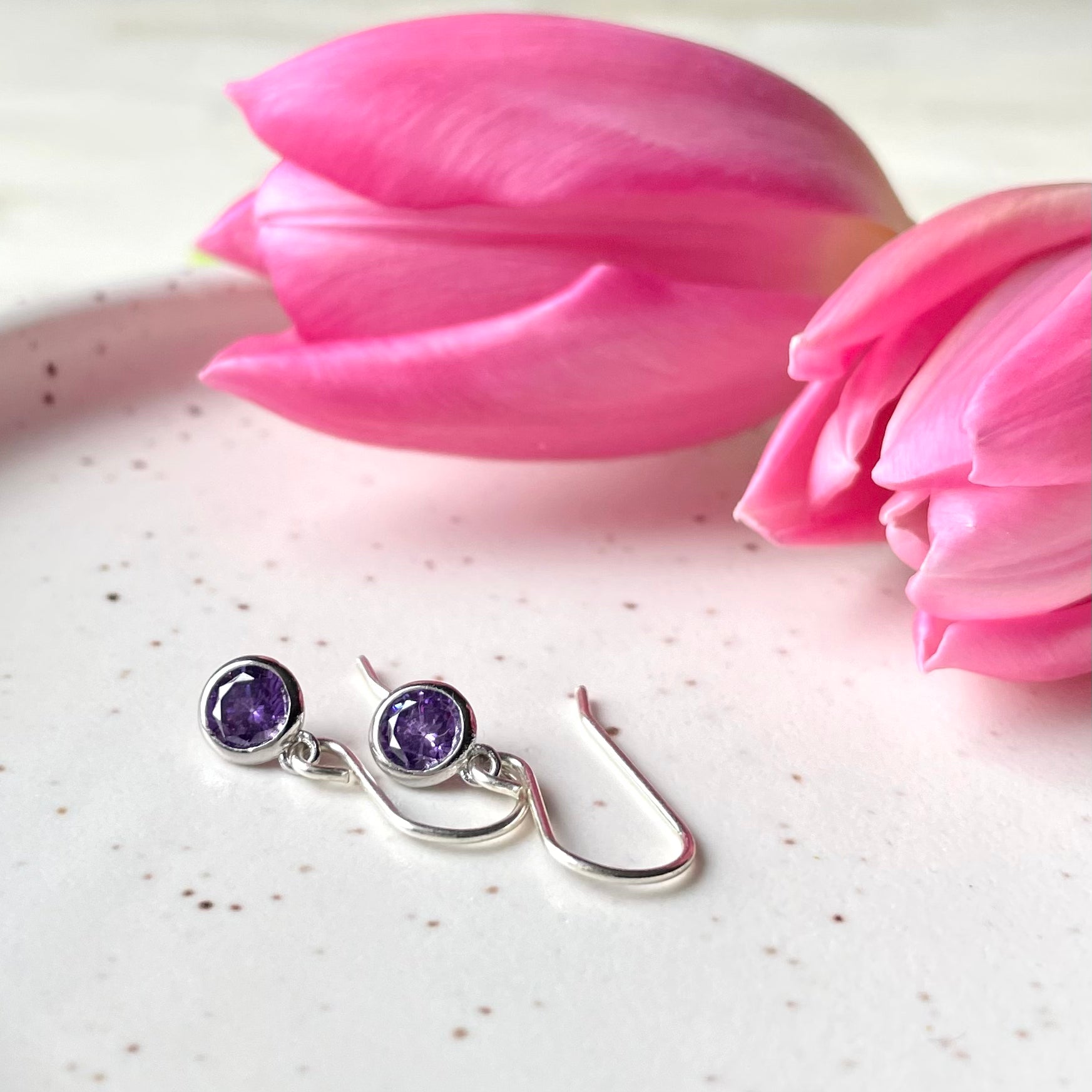 February birthstone earrings. Purple cubic zirconia silver earrings.