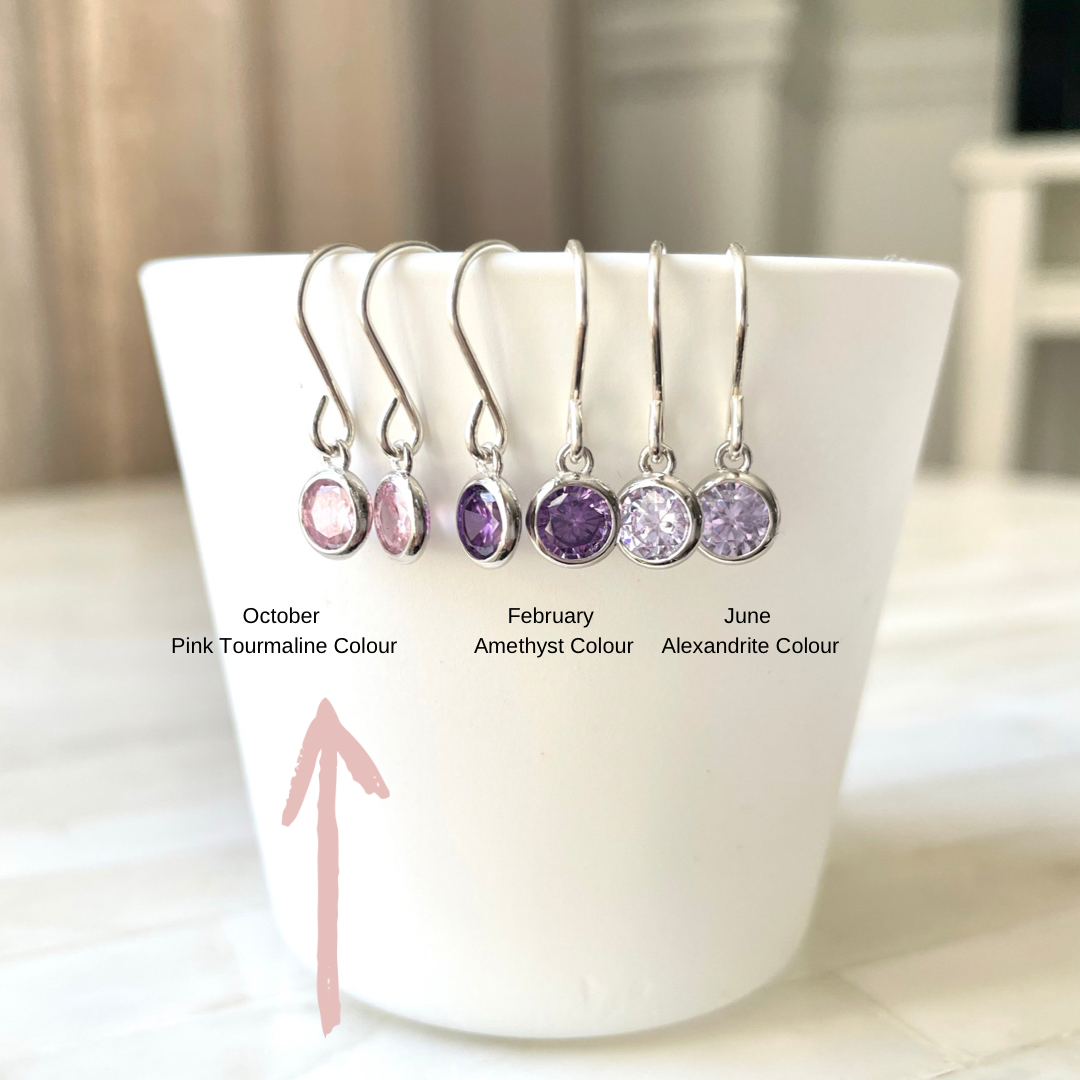 Birthstone earrings by Nancy Wallis Designs. Made in Canada. Sterling Silver and Cubic Zirconia.